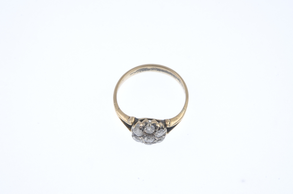 An early 20th century gold diamond cluster ring. The old-cut diamond, within a similarly-cut diamond - Image 2 of 4