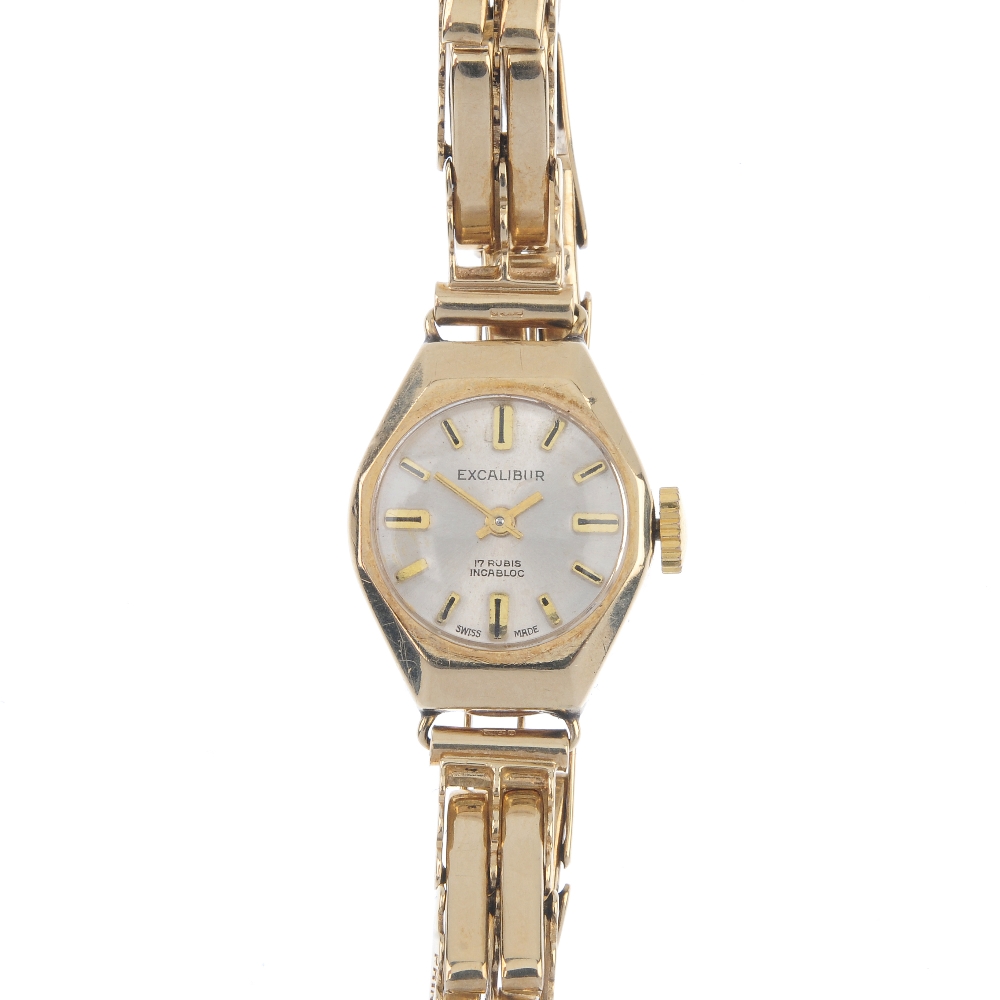 A lady's mid 20th century 9ct gold wristwatch. The silvered and textured dial, reading Excalibur,