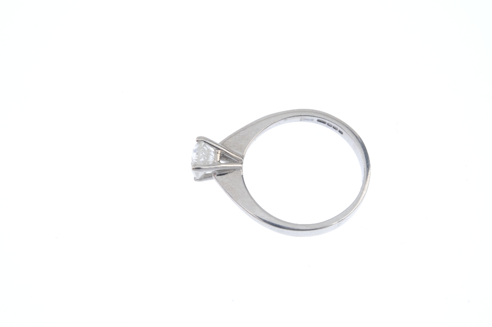 * An 18ct gold diamond single-stone ring. The brilliant-cut diamond, to the tapered shoulders and - Image 3 of 4