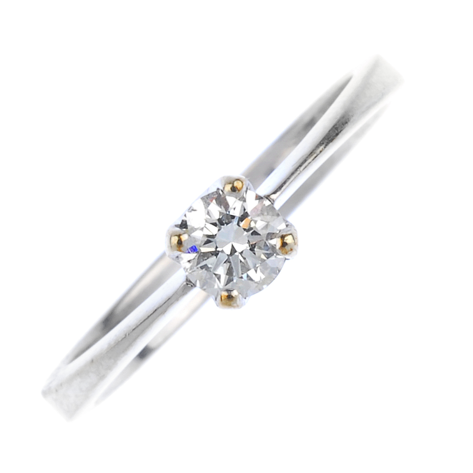 A 9ct gold diamond single-stone ring. The brilliant-cut diamond, to the plain band. Estimated