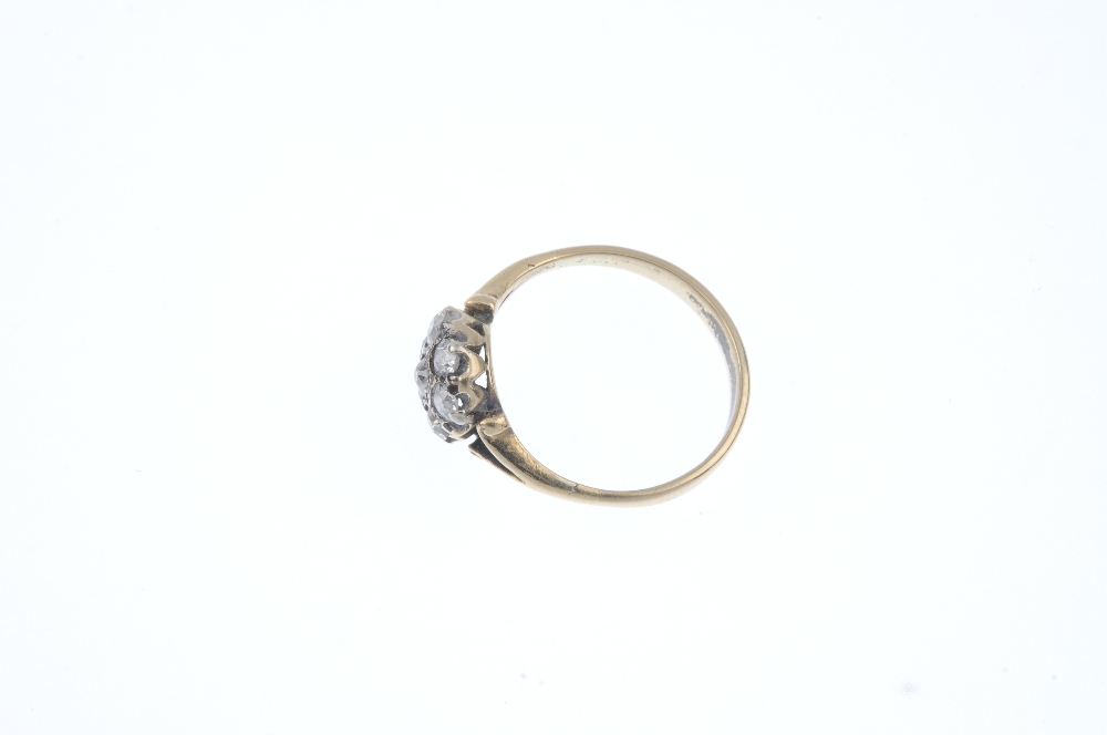 An early 20th century gold diamond cluster ring. The old-cut diamond, within a similarly-cut diamond - Image 3 of 4