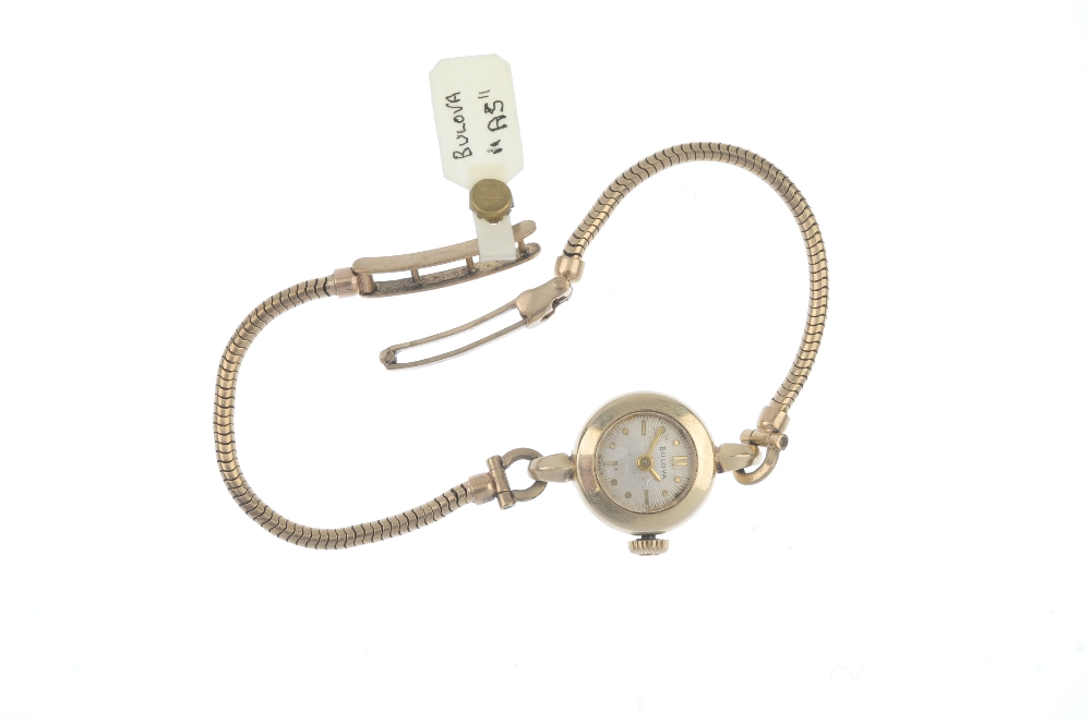 BULOVA - a lady's watch. The circular-shape cream dial with baton markers, to the 9ct gold snake- - Image 3 of 3