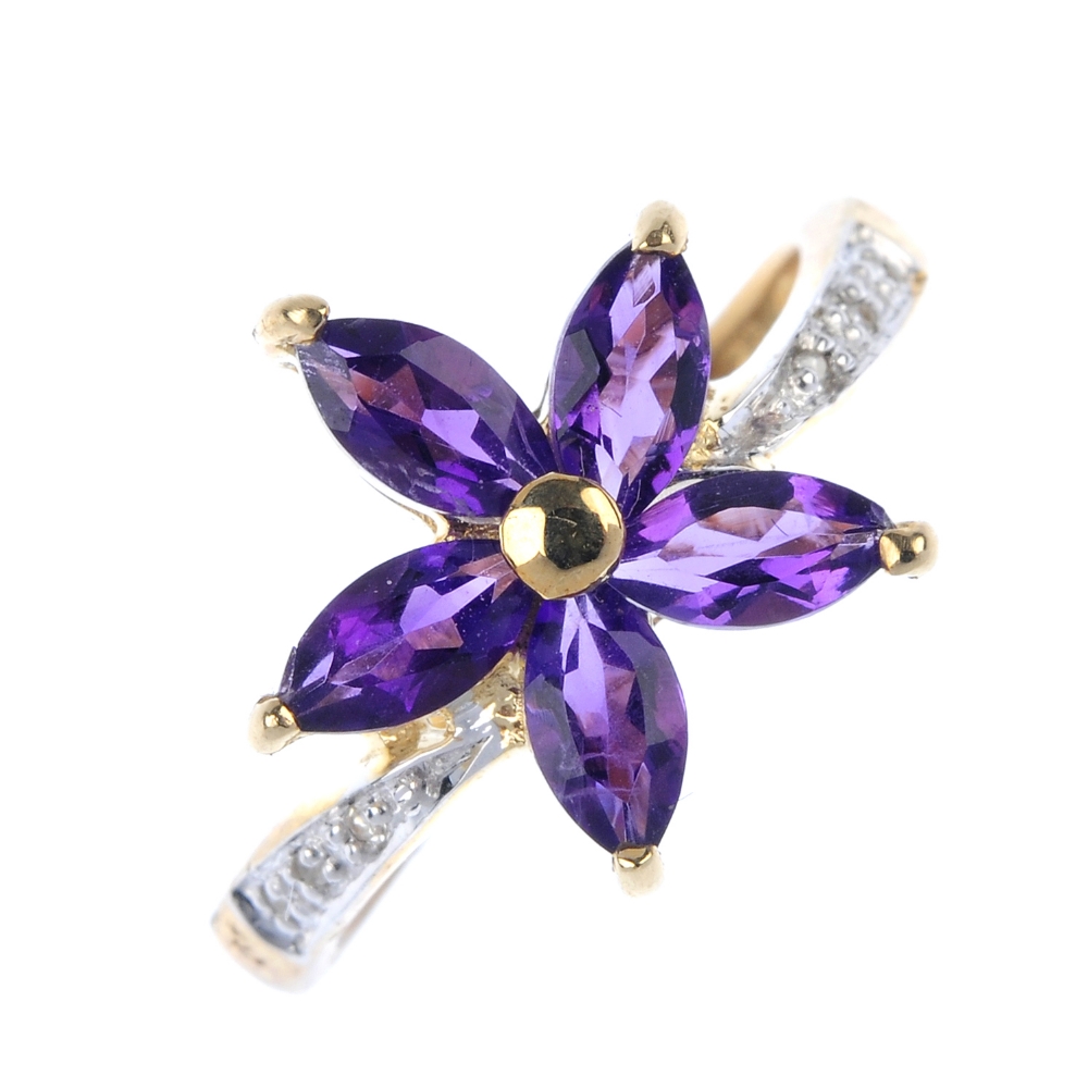 A 9ct gold amethyst and diamond floral ring. The marquise-shape amethyst flower, to the single-cut