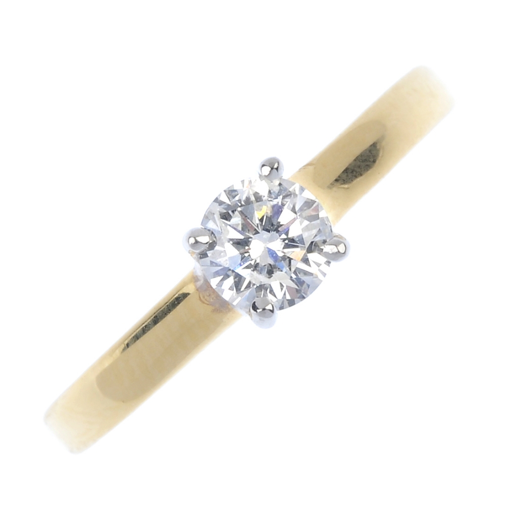 An 18ct gold diamond single-stone ring. The brilliant-cut diamond, to the plain band. Estimated