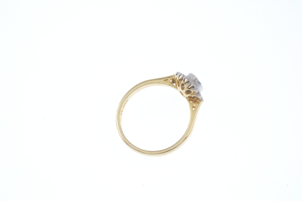 An 18ct gold sapphire and diamond cluster ring. The oval-shape sapphire collet, within a brilliant- - Image 4 of 4