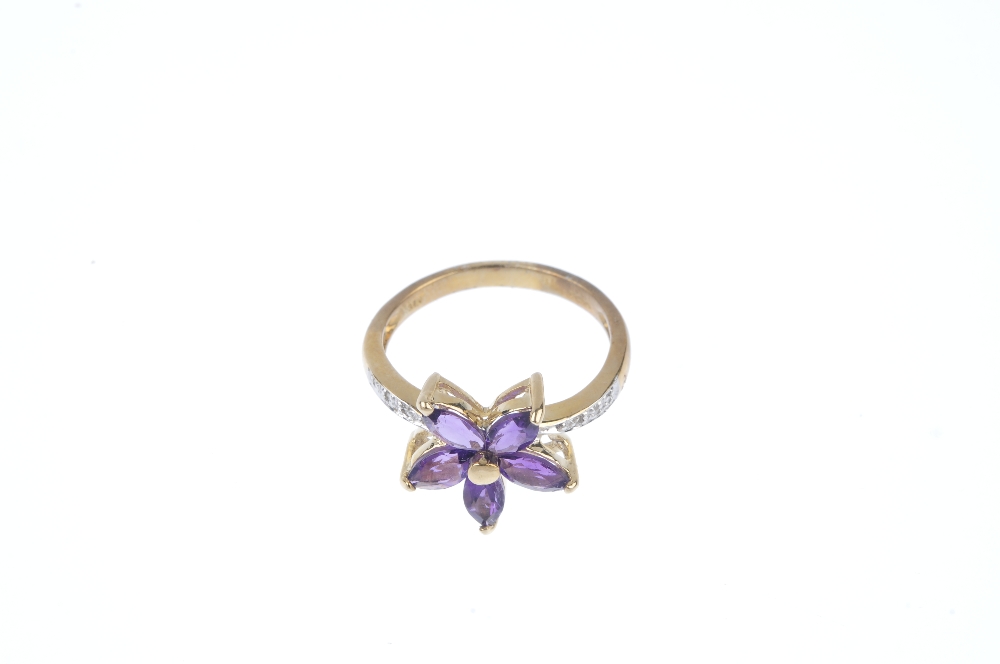 A 9ct gold amethyst and diamond floral ring. The marquise-shape amethyst flower, to the single-cut - Image 2 of 4