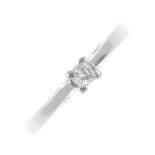 A platinum diamond single-stone ring. The square-shape diamond, to the tapered band. Diamond