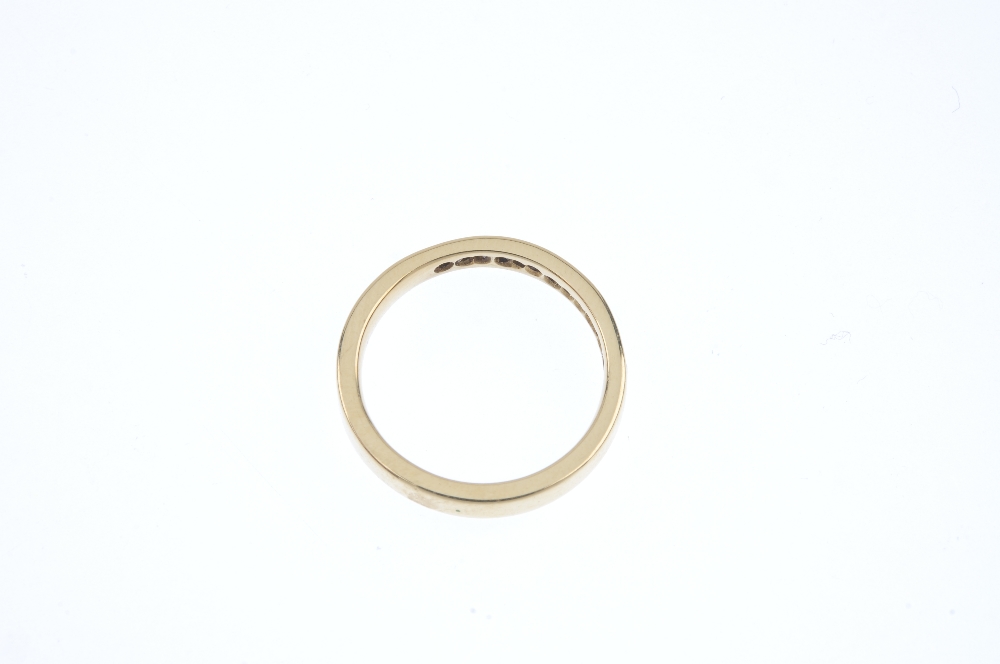 An 18ct gold diamond half-circle eternity ring. The brilliant-cut diamond line, to the plain band. - Image 3 of 3