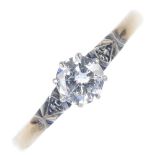 A diamond single-stone ring. The brilliant-cut diamond, with diamond accent shoulders, to the