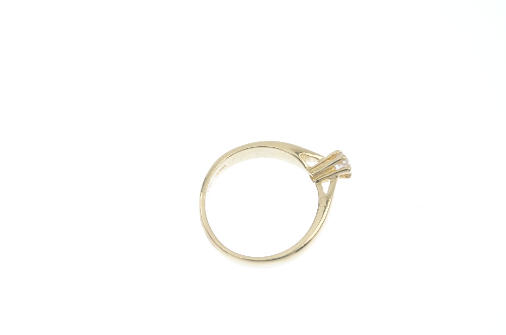 A 14ct gold diamond single-stone ring. The brilliant-cut diamond, to the tapered shoulders and plain - Image 4 of 4