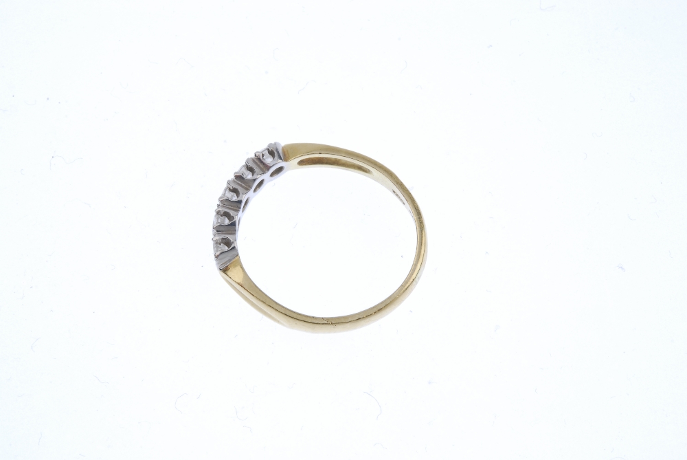 An 18ct gold diamond five-stone ring. The brilliant-cut diamond line, with bar spacers, to the - Image 3 of 4