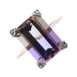 A 9ct gold ametrine and diamond accent ring. The rectangular-shape ametrine, within a single-cut