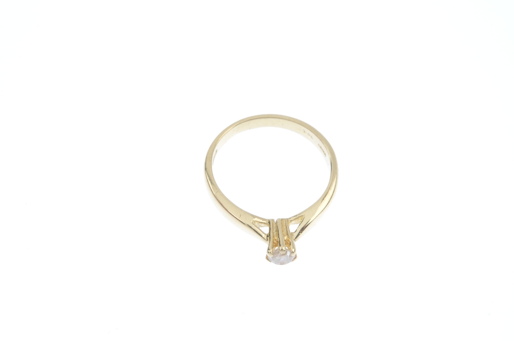 A 14ct gold diamond single-stone ring. The brilliant-cut diamond, to the tapered shoulders and plain - Image 2 of 4