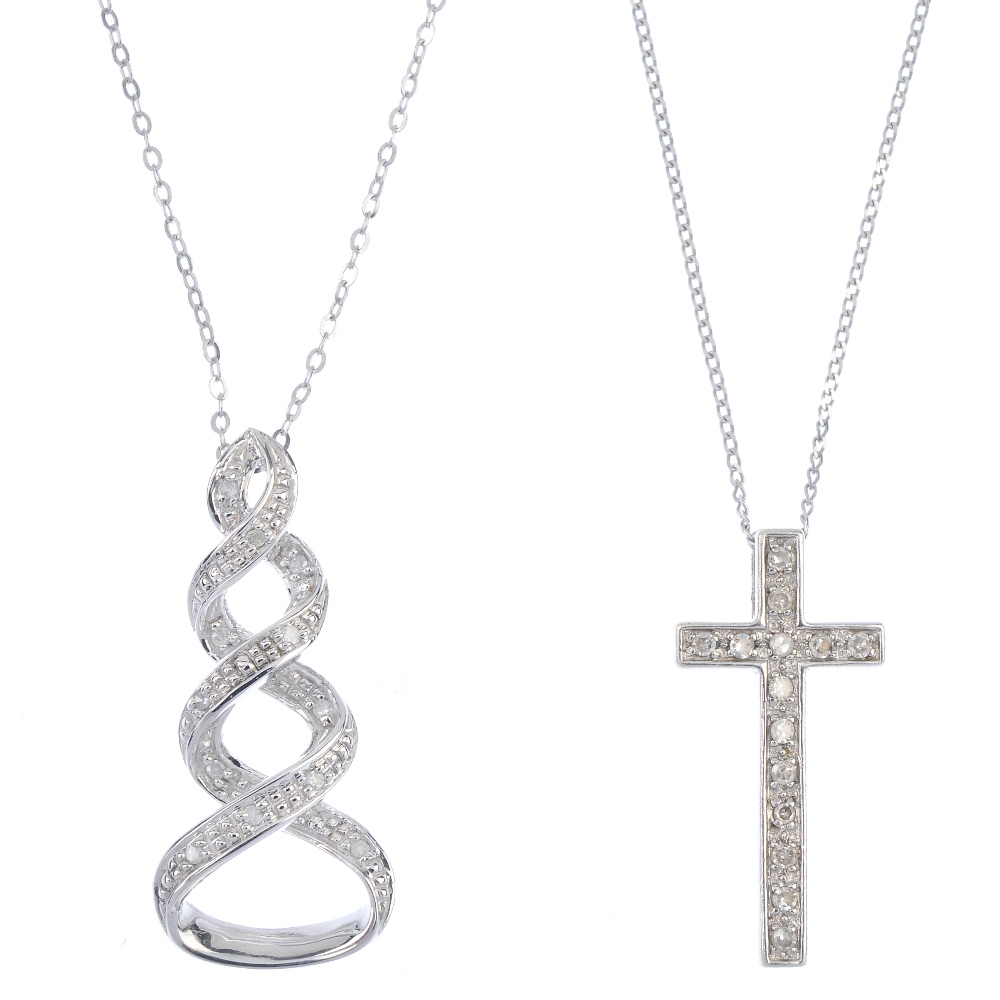A selection of three diamond and gem-set pendants. To include a 9ct gold diamond cross pendant, a