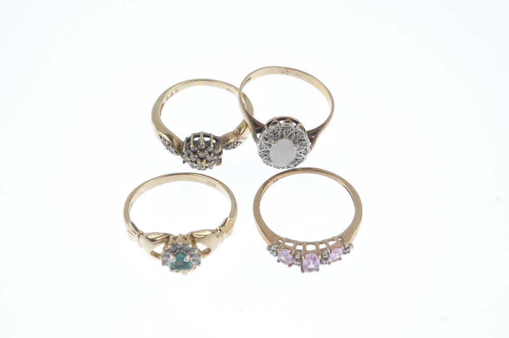 A selection of four diamond and gem-set dress rings. To include a 9ct gold emerald and diamond - Image 2 of 3