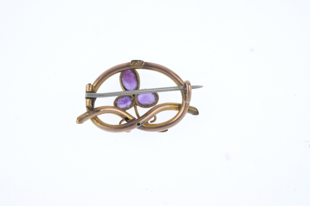 An early 20th century 9ct gold amethyst and split pearl brooch. The oval-shape amethyst and split - Image 2 of 2