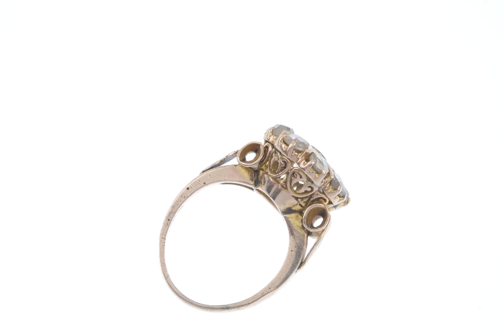 An 18ct gold diamond cluster ring. The rose-cut diamond star, within a similarly-cut diamond - Image 4 of 4