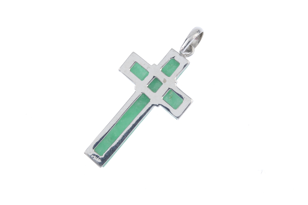 A jade cross pendant. The hemi-cylindrical jadeite panels, forming a cross, suspended from a tapered - Image 2 of 2