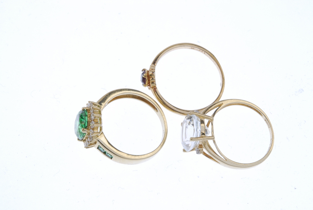 A selection of three gem-set rings. To include an aquamarine single-stone ring, a 14ct gold green - Image 3 of 4