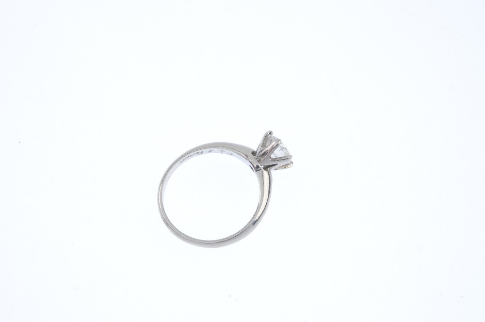 A diamond single-stone ring. The brilliant-cut diamond, weighing 0.70ct, to the tapered band. - Image 4 of 5