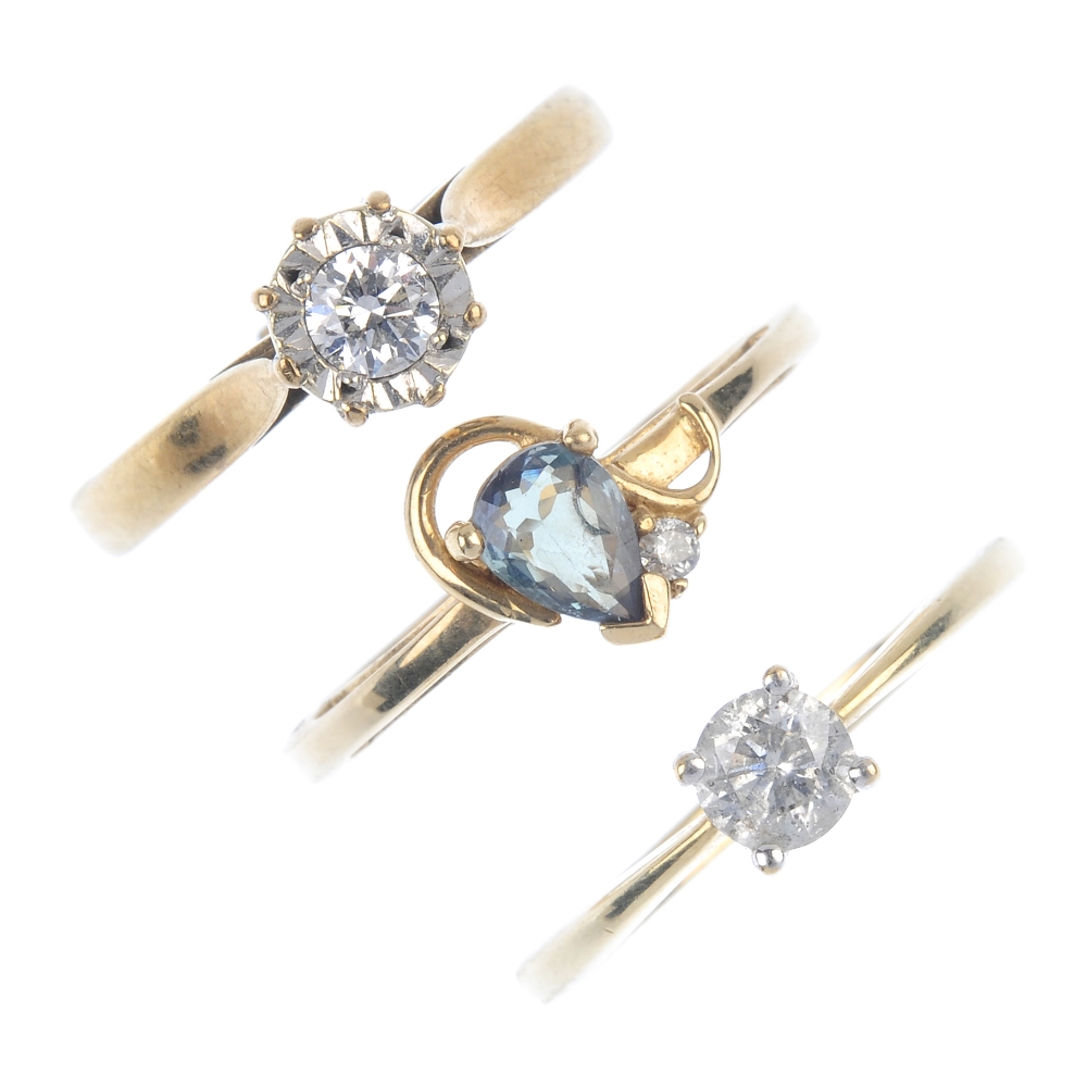 A selection of three 9ct gold diamond and gem-set rings. To include a green chrysoberyl ring with