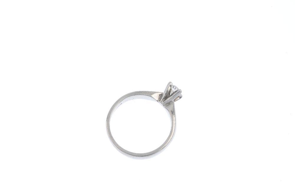 A platinum diamond single-stone ring. The brilliant-cut diamond, to the plain band. Estimated - Image 4 of 4