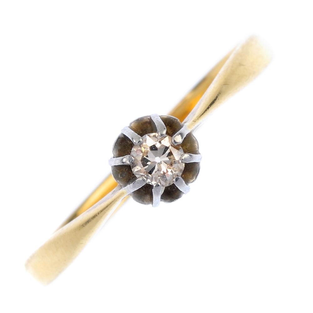 A mid 20th century 18ct gold and platinum diamond single-stone ring. The circular-cut diamond, to