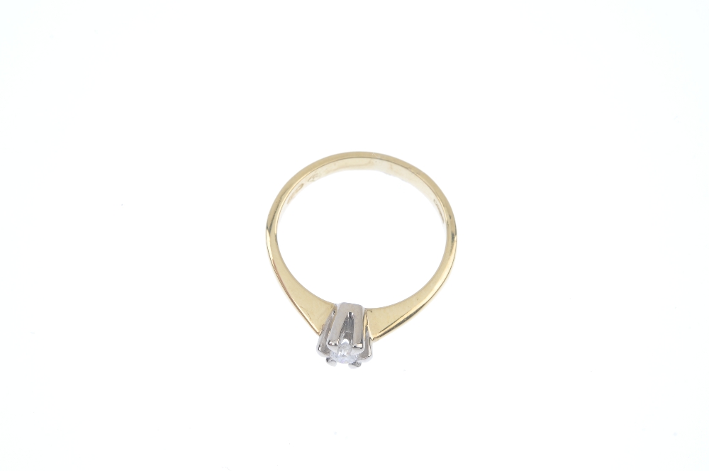 An 18ct gold diamond single-stone ring. The brilliant-cut diamond, to the tapered shoulders and - Image 2 of 4