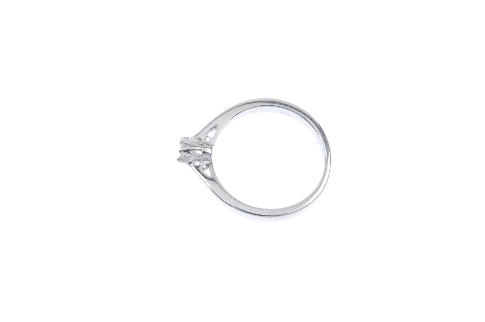 * An 18ct gold diamond single-stone ring. The brilliant-cut diamond, to the tapered shoulders and - Image 3 of 4