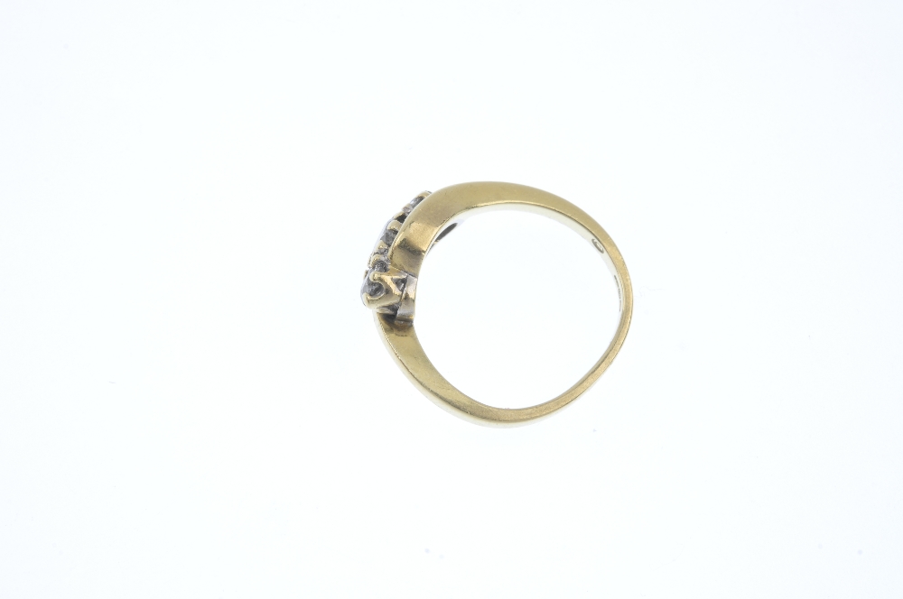 An 18ct gold diamond crossover ring. The graduated brilliant-cut diamond line, to the asymmetric - Image 3 of 4