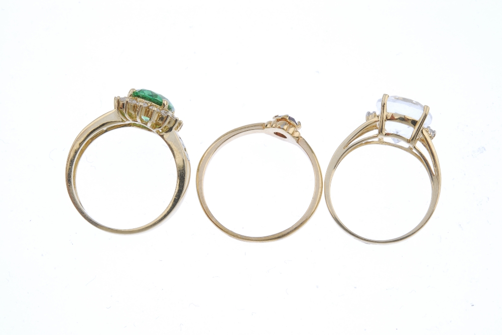 A selection of three gem-set rings. To include an aquamarine single-stone ring, a 14ct gold green - Image 4 of 4