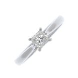 A platinum diamond single-stone ring. The square-shape diamond, to the plain band. Diamond weight