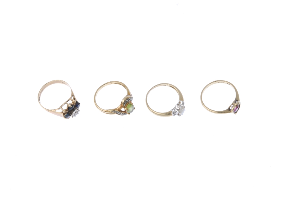 A selection of four diamond and gem-set rings. To include an oval-shape peridot and diamond - Image 3 of 4