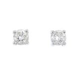 Two pairs of brilliant-cut diamond ear studs. Estimated total diamond weight 0.45ct. Principal