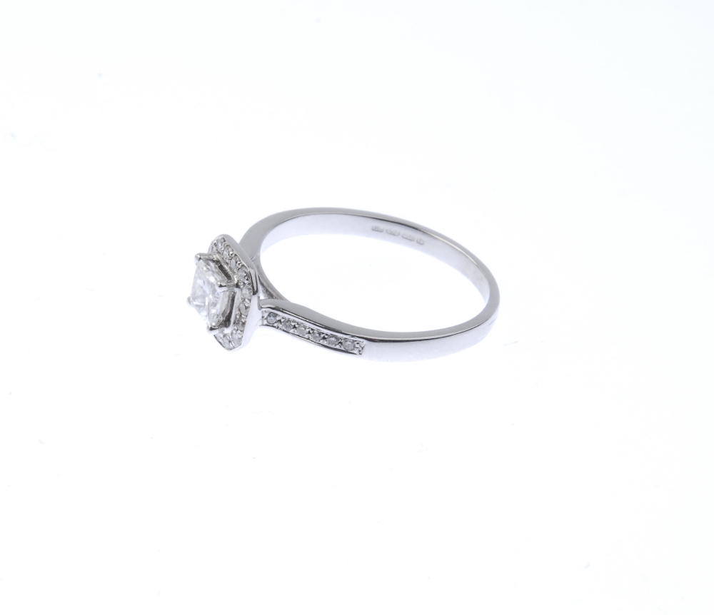 An 18ct gold diamond cluster ring. The square-shape diamond, within a brilliant-cut diamond halo, to - Image 4 of 4