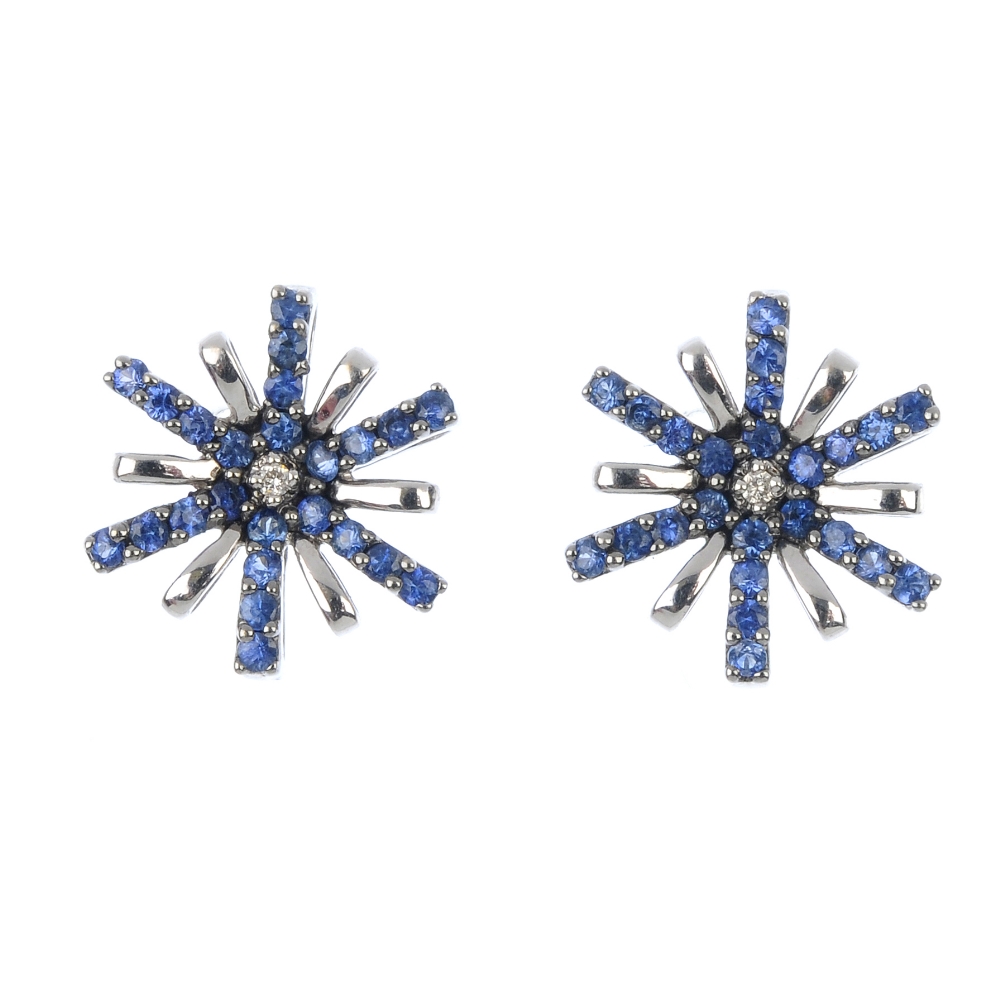 A pair sapphire and diamond ear studs. Each designed as alternating circular-shape sapphire and