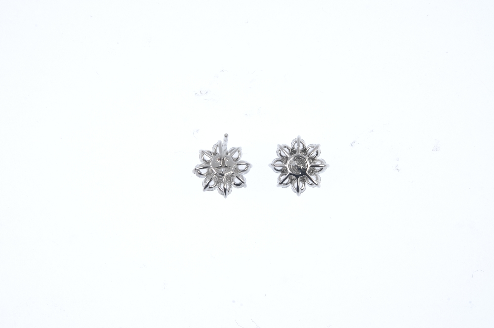* A pair of diamond floral cluster ear studs. Each designed as a brilliant-cut diamond cluster, - Image 2 of 4