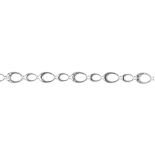 A 9ct gold bracelet. Designed as a series of alternating oval-shape polished and single-cut