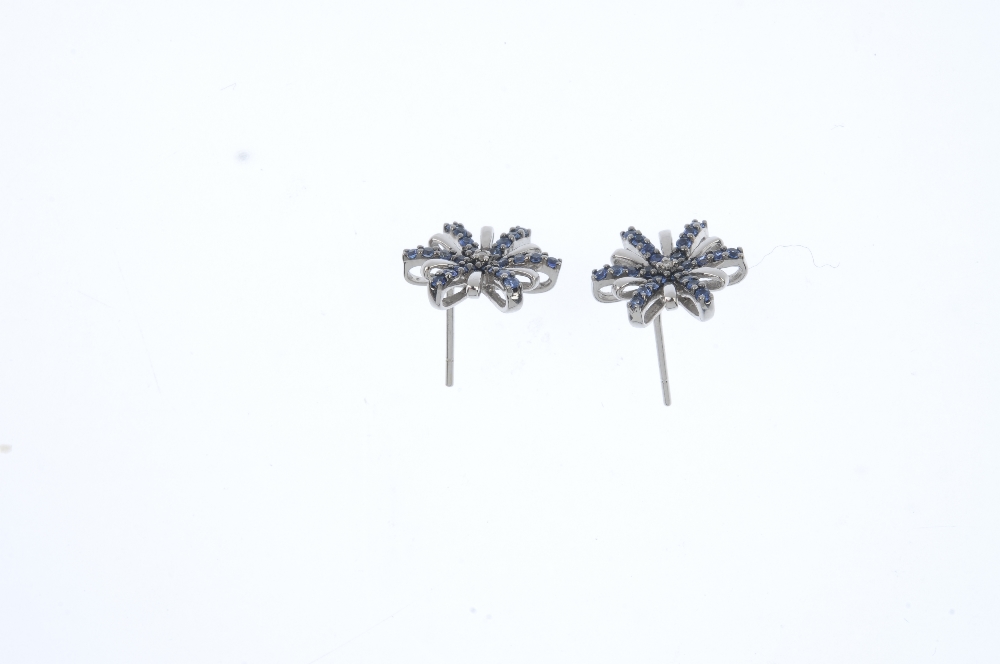 A pair sapphire and diamond ear studs. Each designed as alternating circular-shape sapphire and - Image 3 of 3