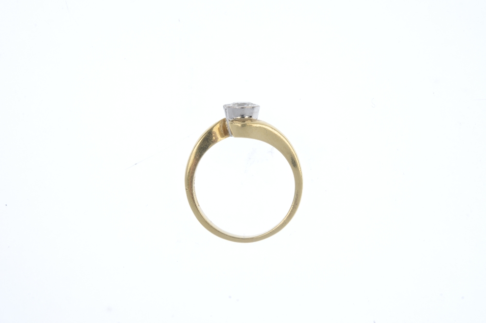 An 18ct gold diamond single-stone ring. The brilliant-cut diamond partial collet, to the crossover - Image 2 of 3