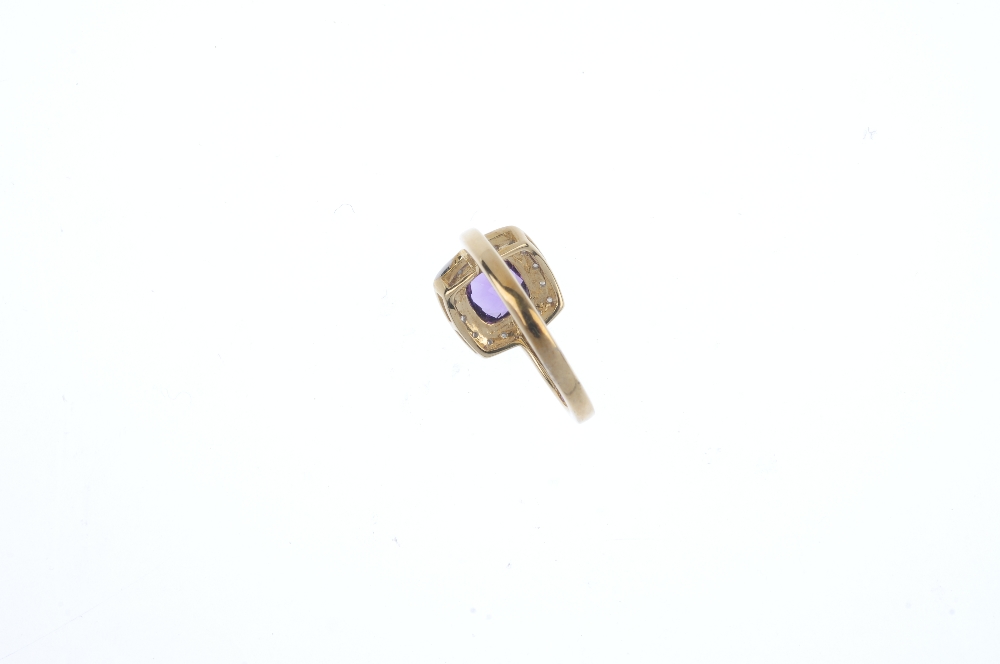 A 9ct gold amethyst and diamond cluster ring. The square-shape amethyst, within a single-cut diamond - Image 4 of 4