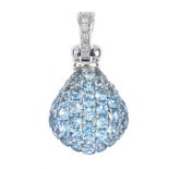 An 18ct gold aquamarine and diamond pendant. The pave-set aquamarine pear-shape cluster, to the