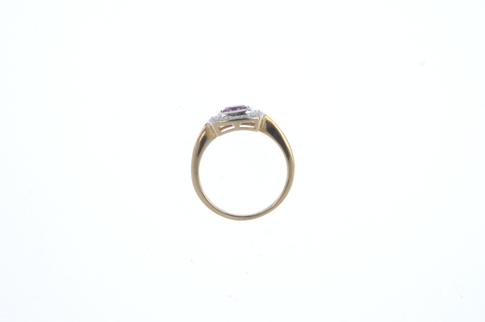 A 9ct gold amethyst and diamond cluster ring. The square-shape amethyst, within a single-cut diamond - Image 2 of 4