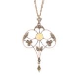 An early 20th century opal 9ct gold and split pearl pendant. The circular opal cabochon, within a