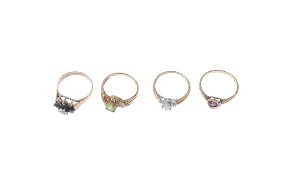 A selection of four diamond and gem-set rings. To include an oval-shape peridot and diamond - Image 2 of 4
