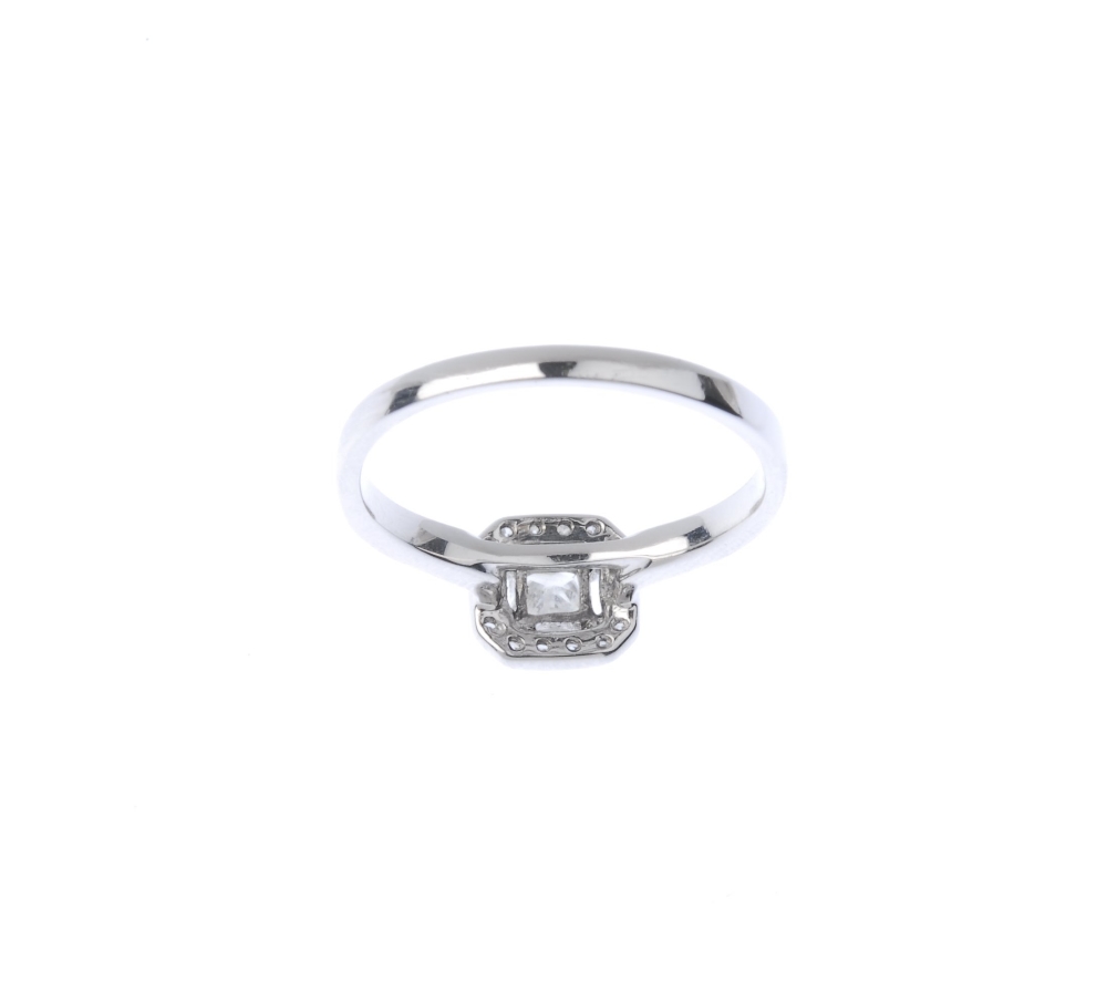 An 18ct gold diamond cluster ring. The square-shape diamond, within a brilliant-cut diamond halo, to - Image 3 of 4