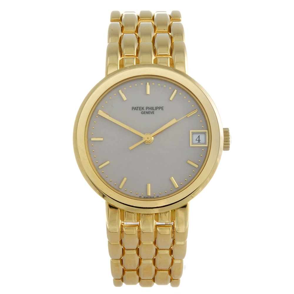 PATEK PHILIPPE - a gentleman's Calatrava bracelet watch. Circa 1994. 18ct yellow gold case.