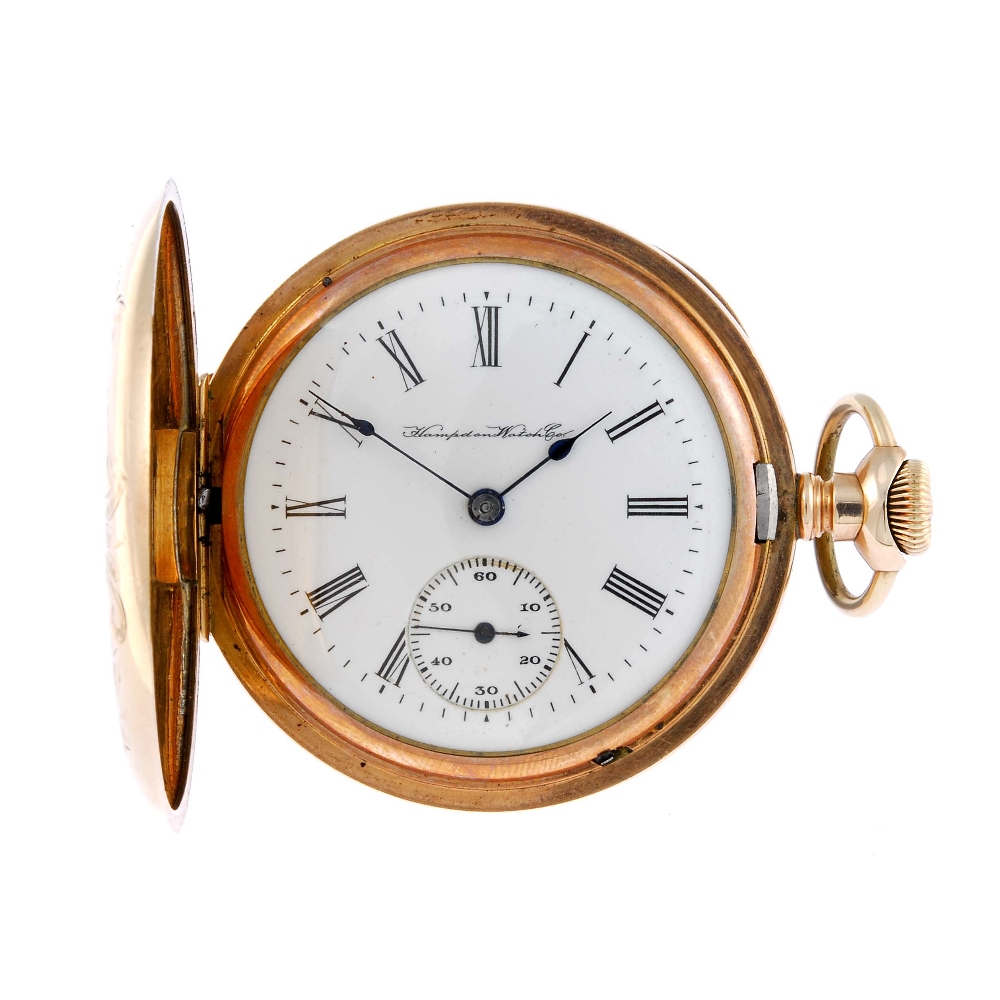 A full hunter pocket watch by Hampden Watch Company. Gold plated case. Numbered 7987724. Signed