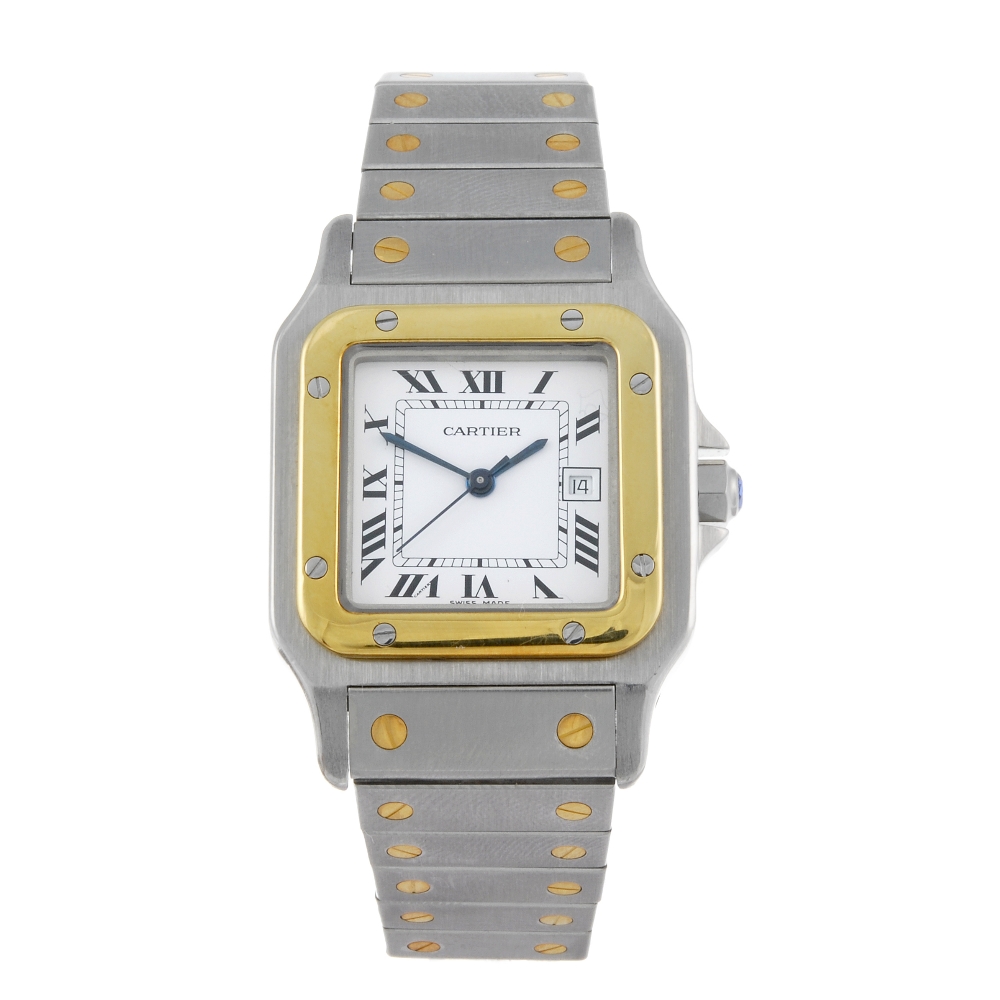 CARTIER - a Santos bracelet watch. Stainless steel case with yellow metal bezel. Numbered 1172961