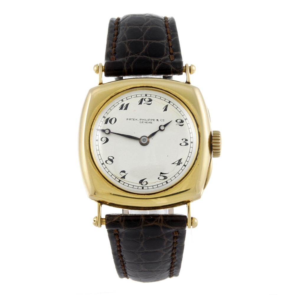 PATEK PHILIPPE - a gentleman's wrist watch. Yellow metal case, stamped 18Kts with poincon.